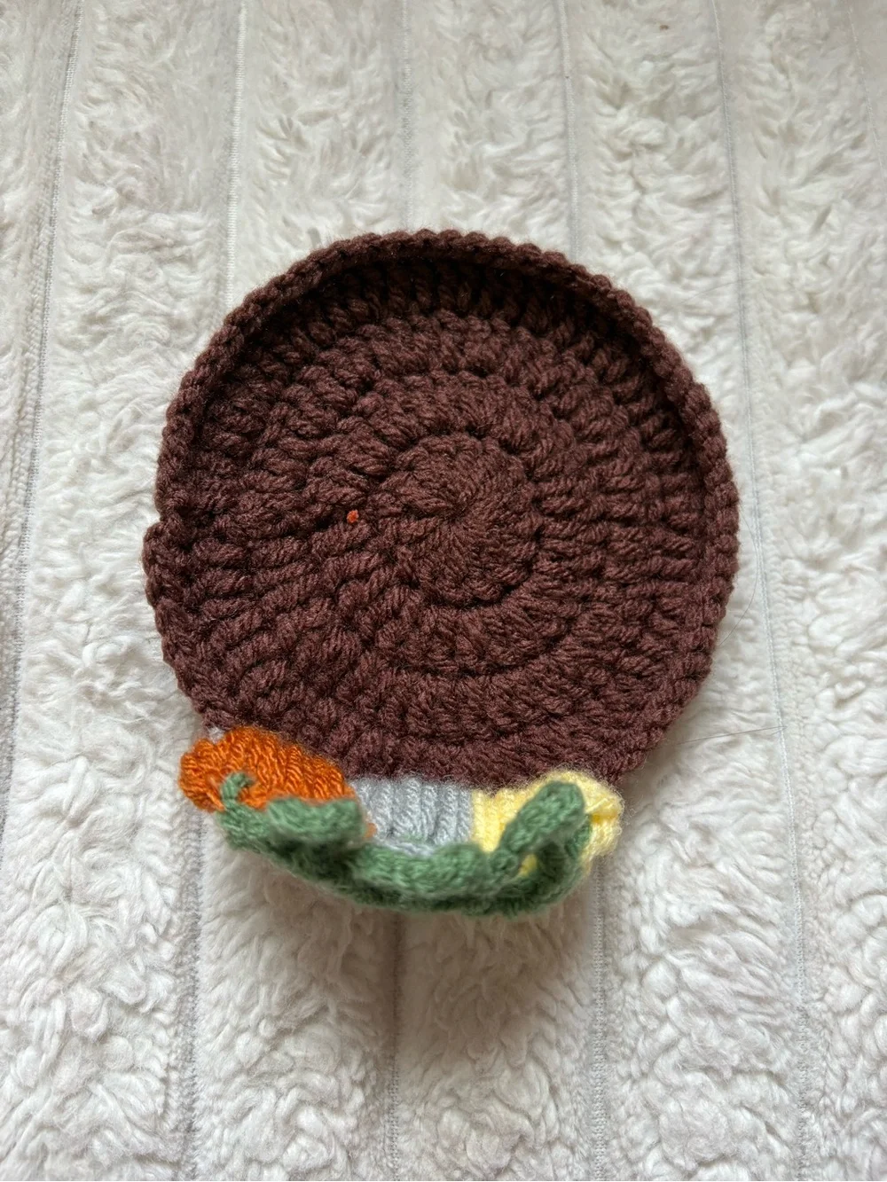 Handmade Brown Crochet Coaster with Orange, Gray, and Yellow Pumpkins